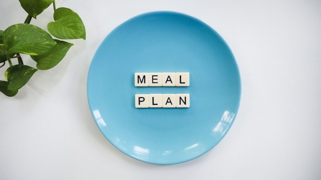 plan to lose 200 lbs plate with the words meal plan on it